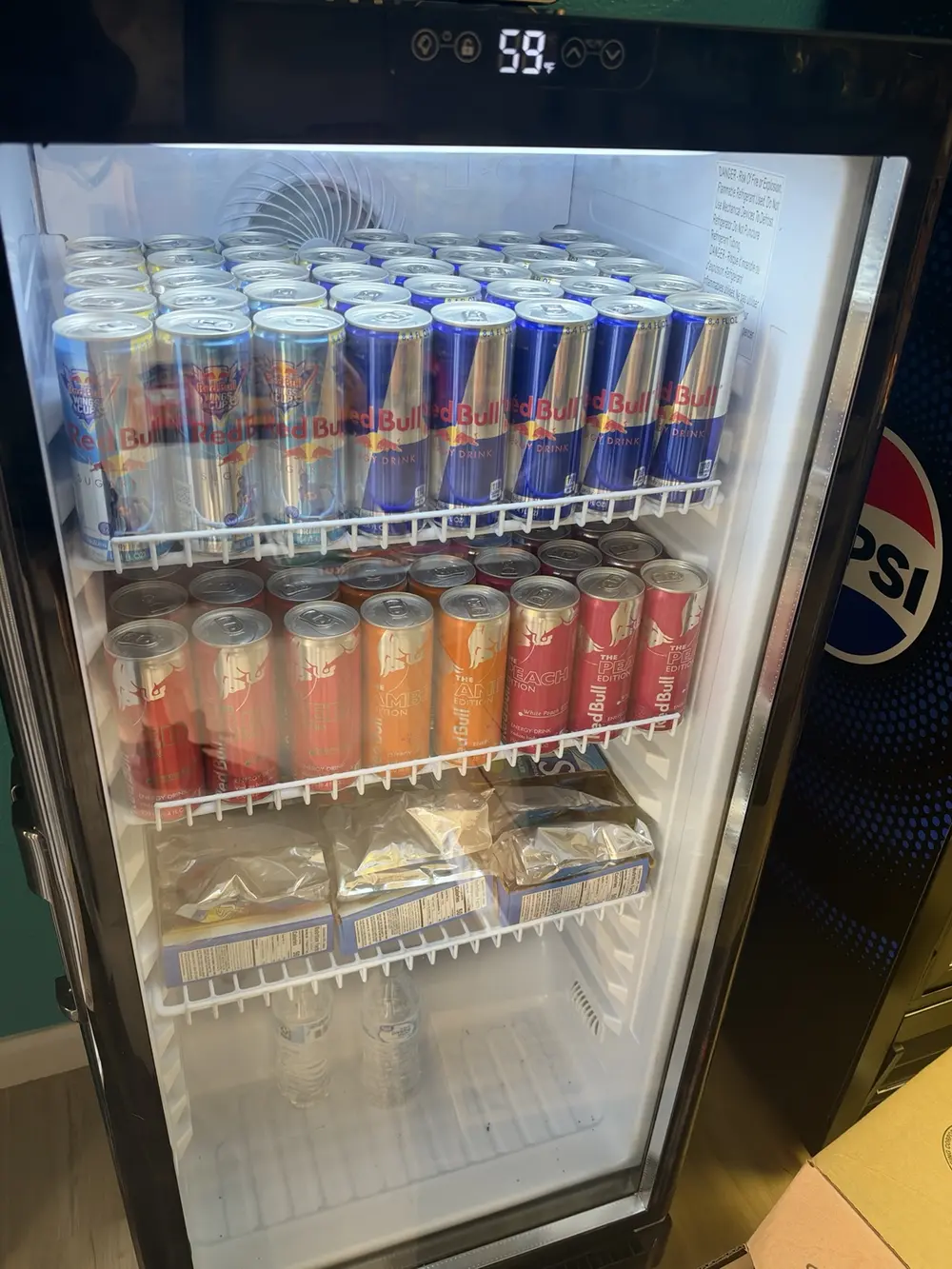 Red Bull cooler stocked with several flavors